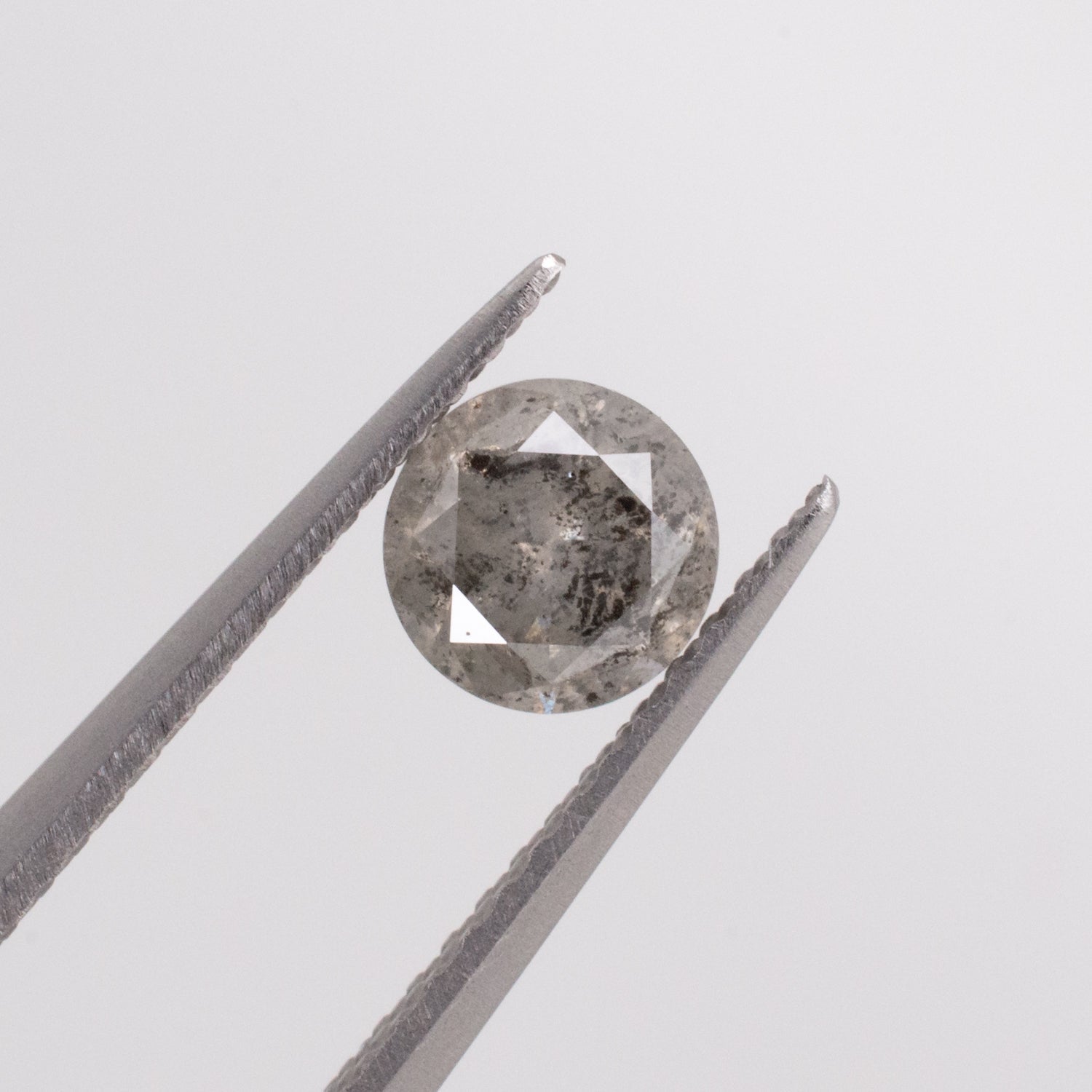 0.56ct Round Brilliant Cut Loose Salt & Pepper Diamond - Malleable Jewellers