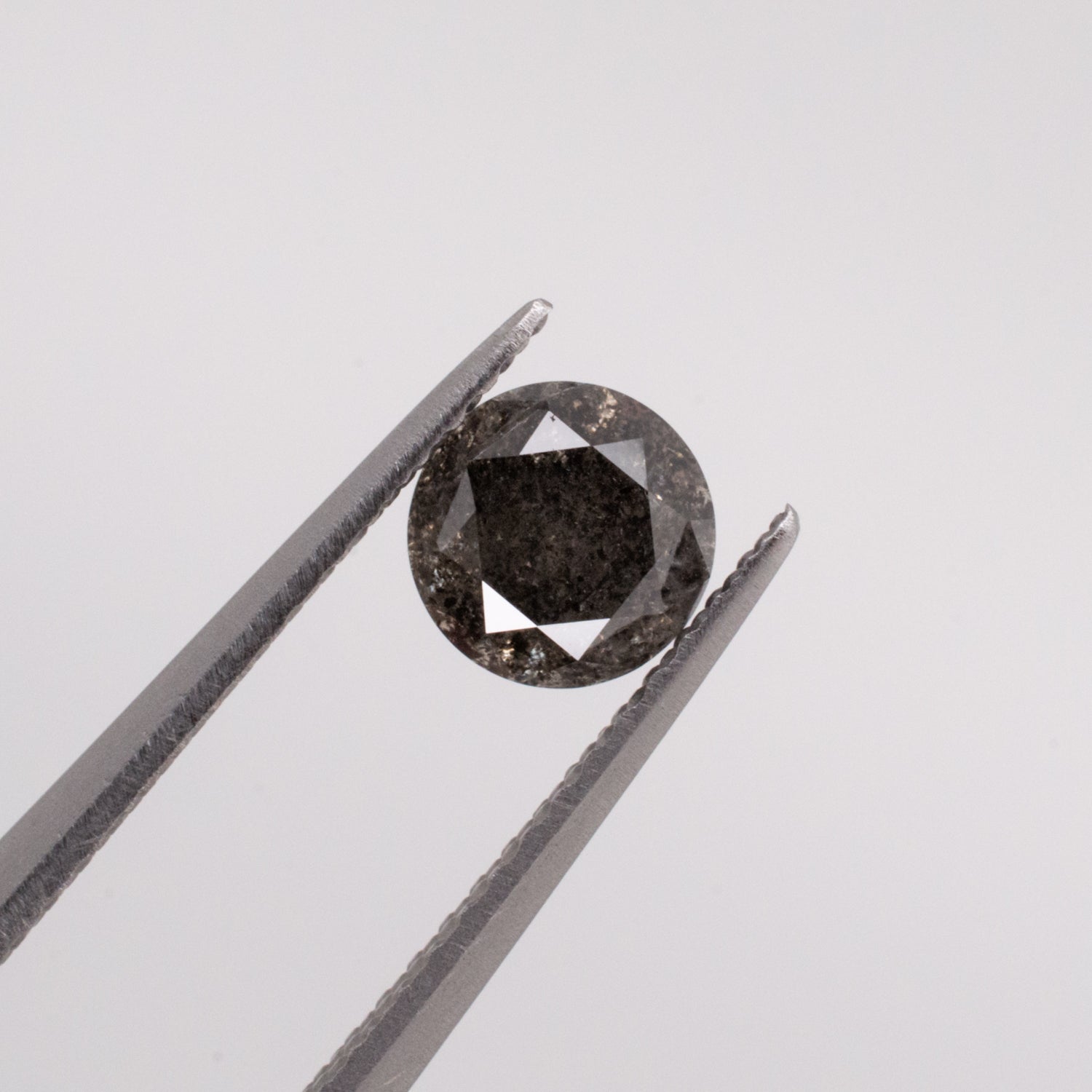 0.67ct Round Brilliant Cut Loose Salt & Pepper Diamond - Malleable Jewellers